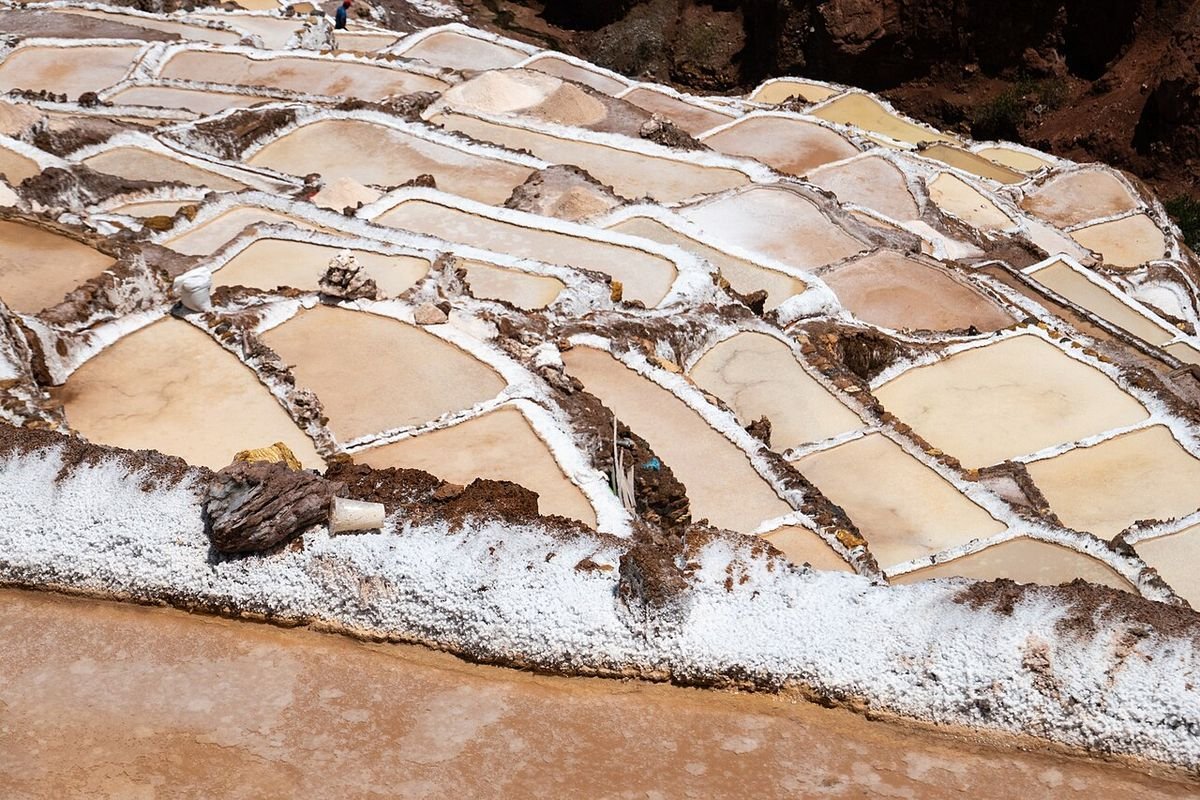 Close-up of a salt crust at the edge of a pool